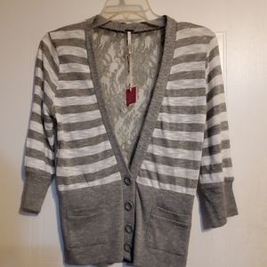 Grey blouse.